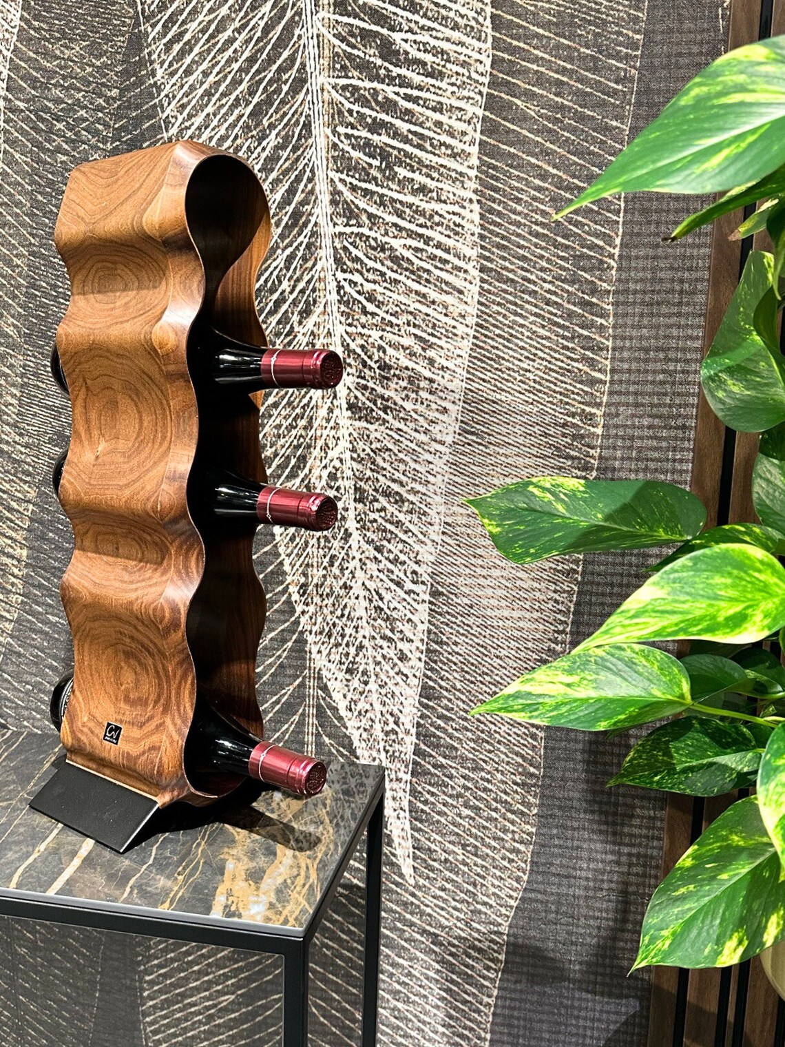 Trunk: Sculptural Solid Wood Wine Rack by OWN Studio on a premium marble kitchen counter